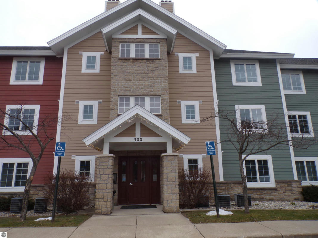 1246 SUNNYSIDE DR APT 306, CADILLAC, MI 49601, photo 1 of 19